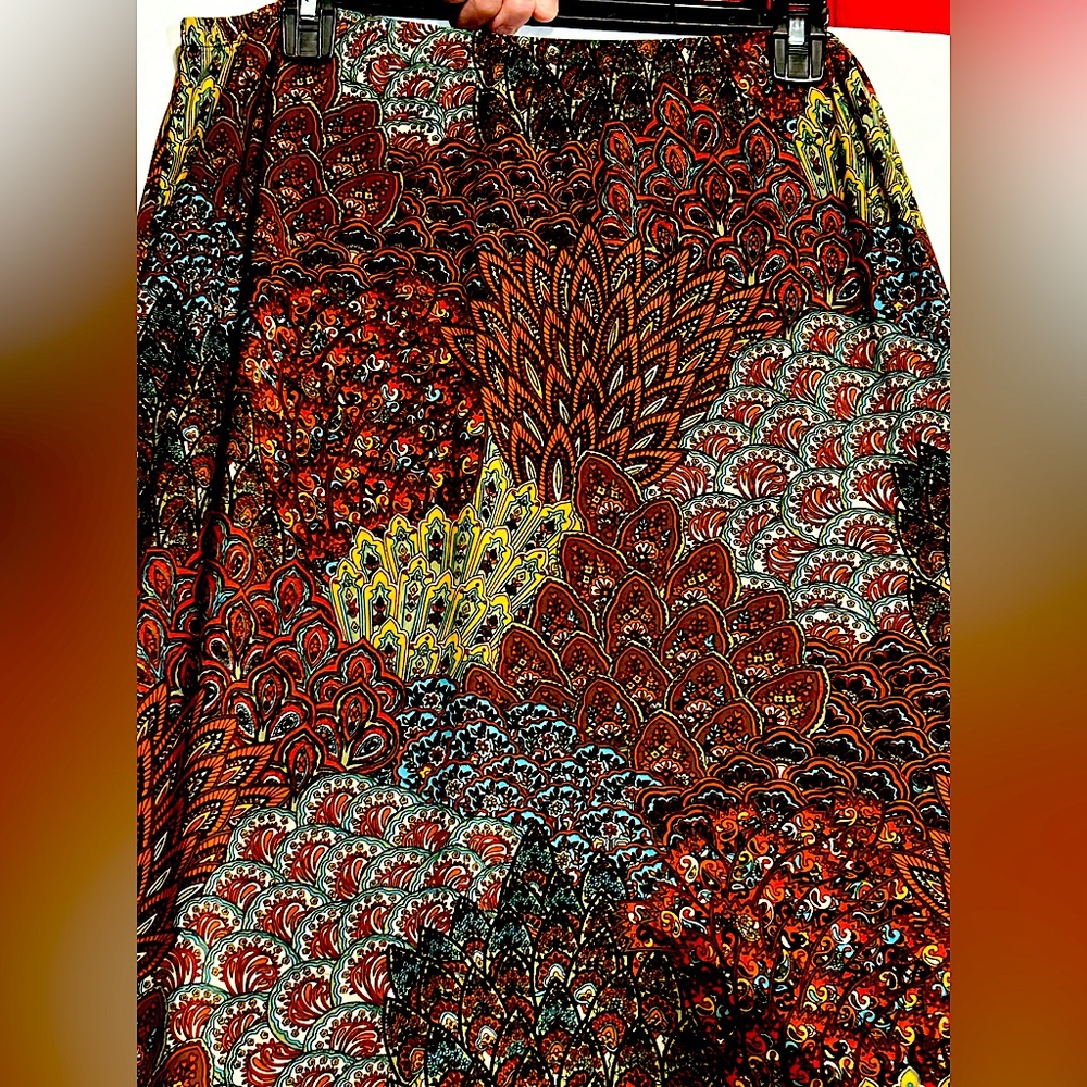 Women’s Elastic Waist Skirt, 34” from waist to hem. Soft polyester material.